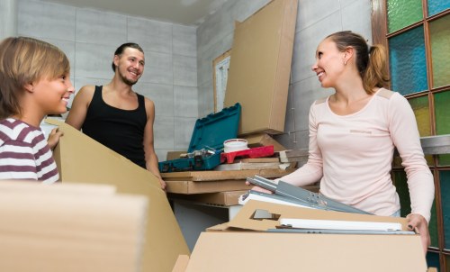Moving van and boxes ready for a house removal in Colliers Wood