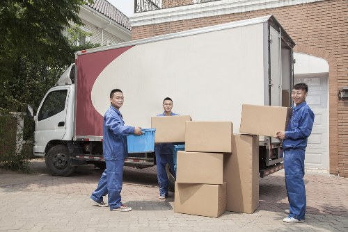 Careful furniture handling during a Colliers Wood removal job