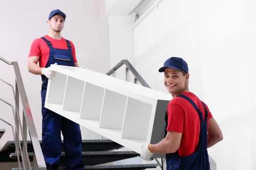 Furniture collection process for a flat in Colliers Wood with tight access
