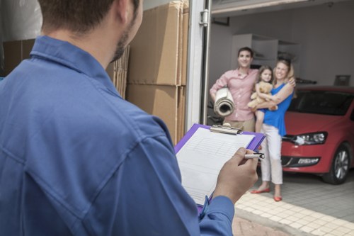 Commercial moving team organising office items in Collierswood