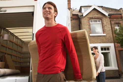 Furniture being loaded for a local move in Colliers Wood