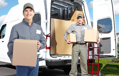 Moving boxes and home items with a local removals van