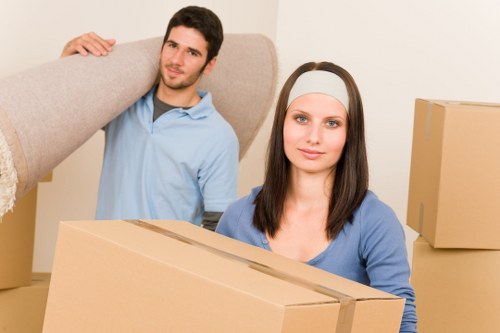 A removals team loading household items for a larger property move